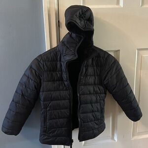 Kids reversible insulated fleece jacket. Water & wind resistant, full zip front